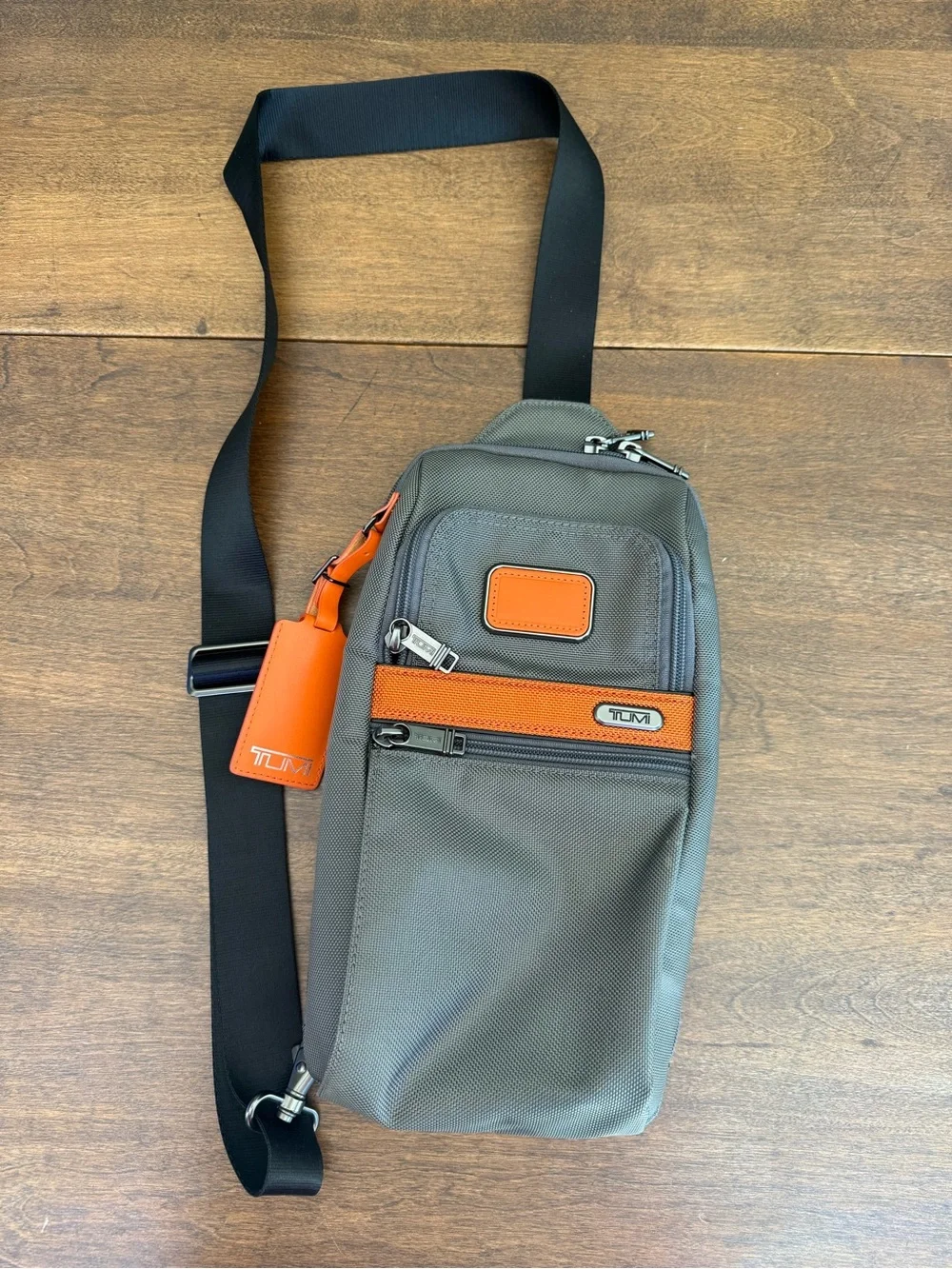 Tumi Alpha Large Sling Bag - Grey with Black & Orange